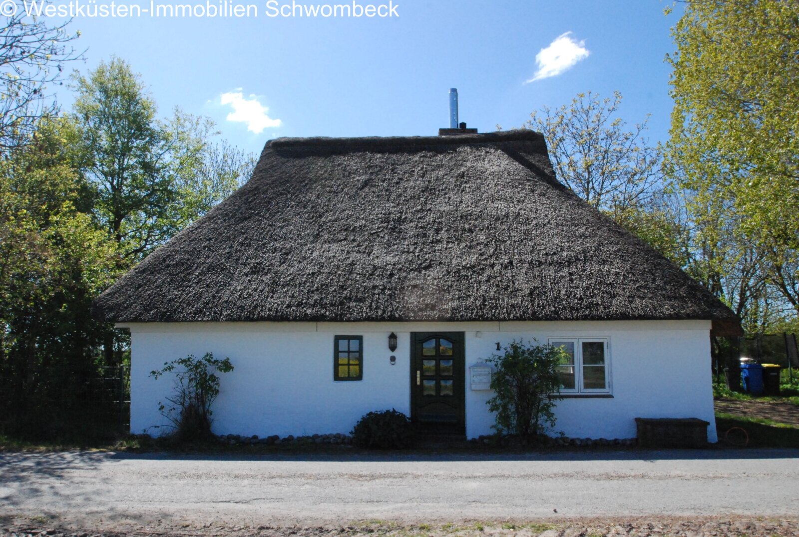 Traditionelles Reetdachhaus mit zeitlosem Flair Traditionelles Reetdachhaus mit zeitlosem Flair